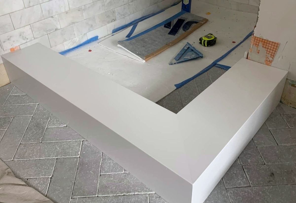 Shower base and wall preparation with tools on site